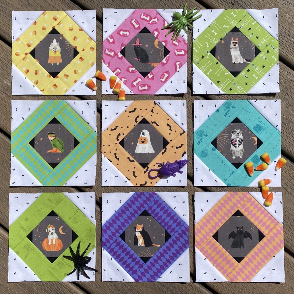 Tell Me A Story quilt blocks with Halloween fussy cuts.